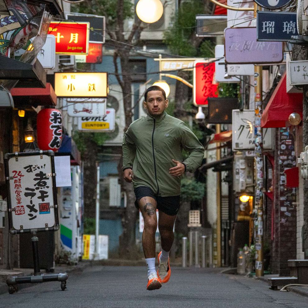 A group of people running in Japan. 